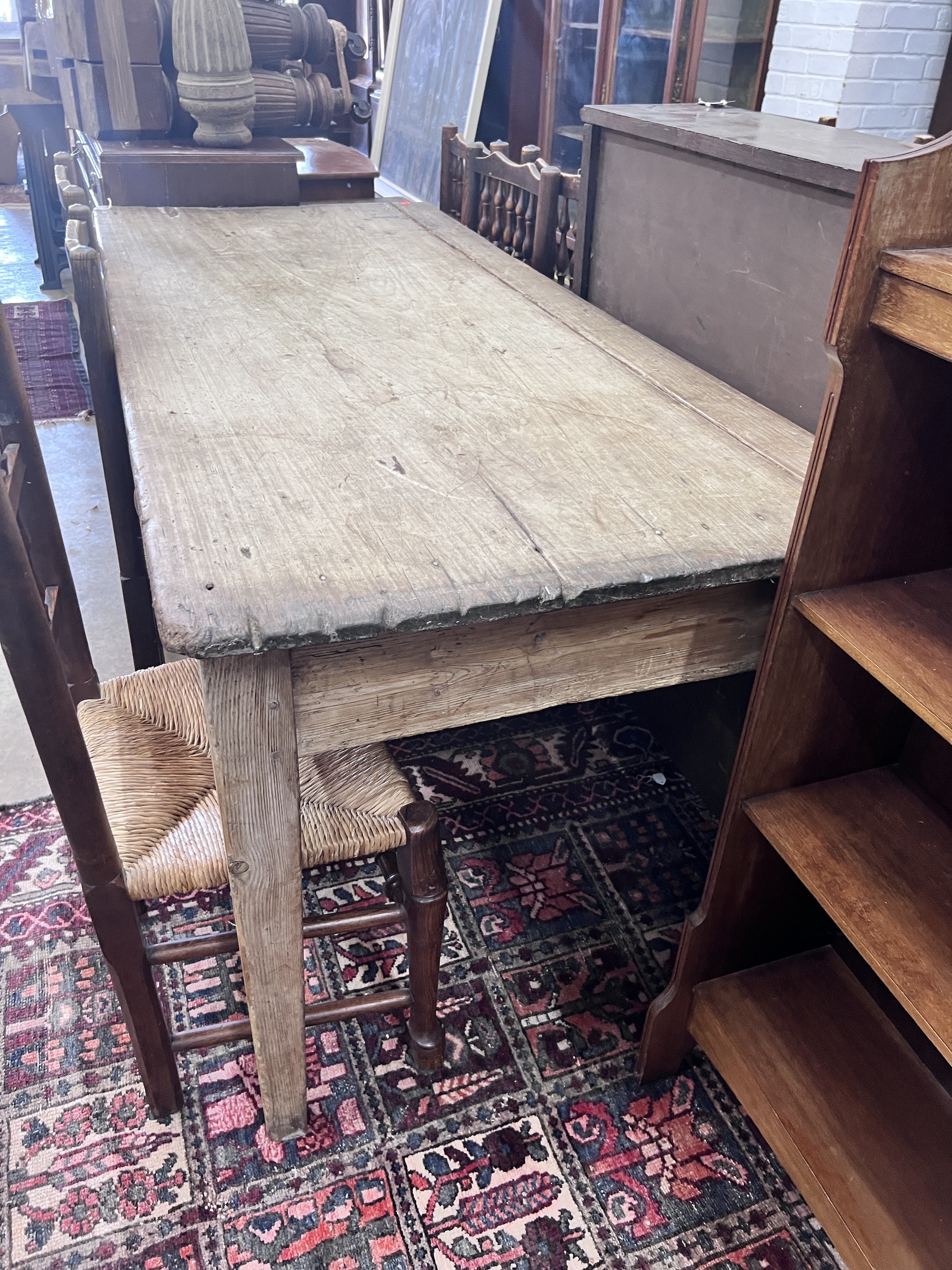 A 19th century rectangular two drawer pine kitchen serving table, length 178cm, depth 77cm, height 79cm